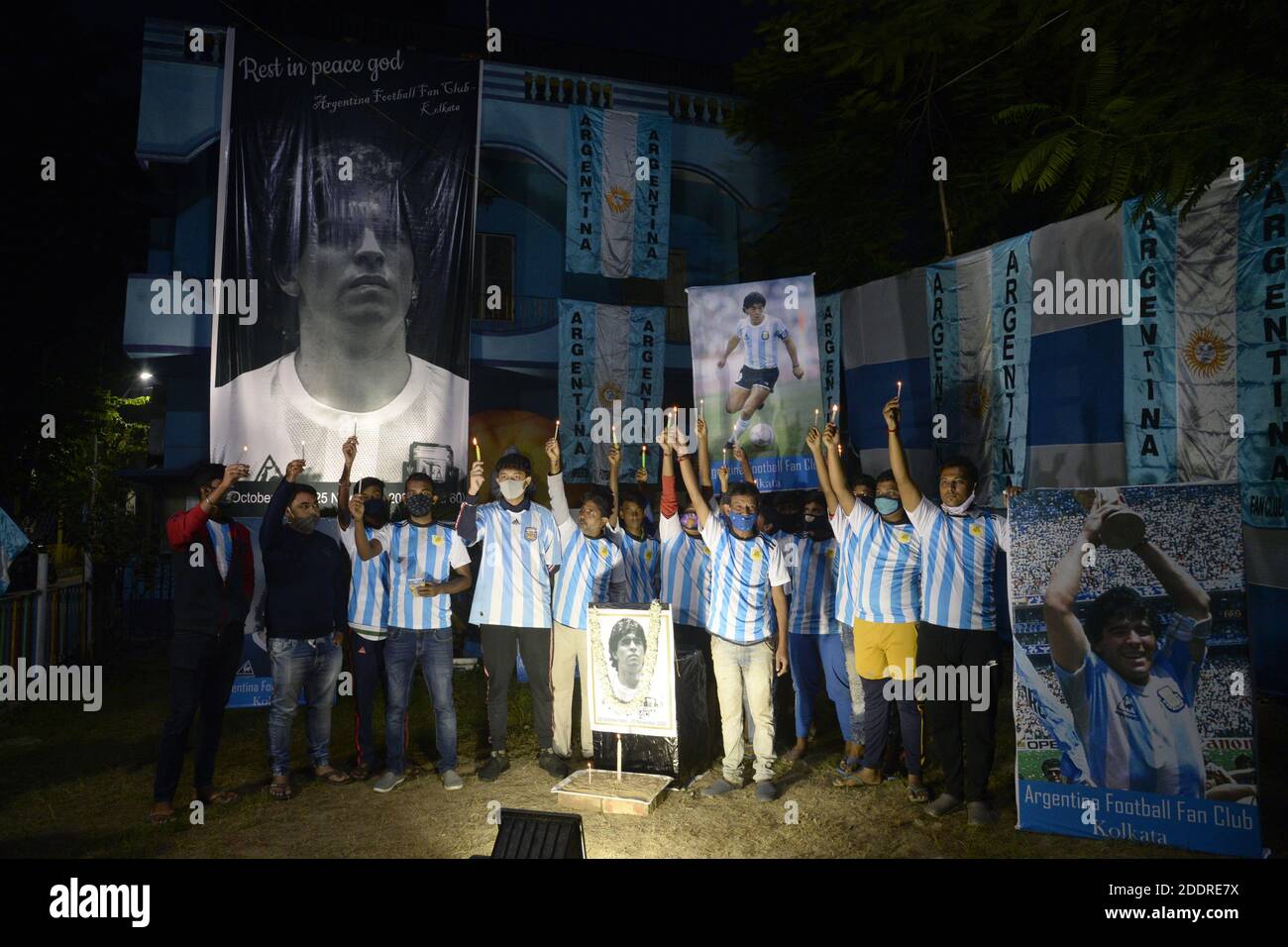 Kolkata, India. 26th Nov, 2020. Maradona Fan club members hold candle to pay homage to Maradona. (Photo by Ved Prakash/Pacific Press) Credit: Pacific Press Media Production Corp./Alamy Live News Stock Photo