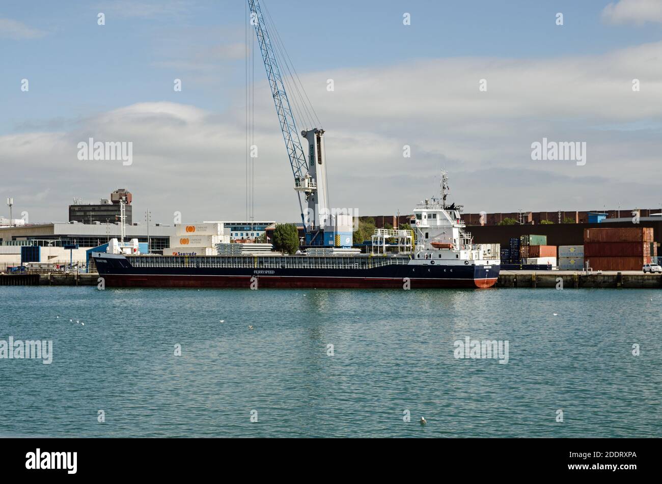 Portsmouth, UK - September 8, 2020: The cargo ship Musketier moored at the dockside in Portsmouth Harbour on a sunny summer day. Stock Photo