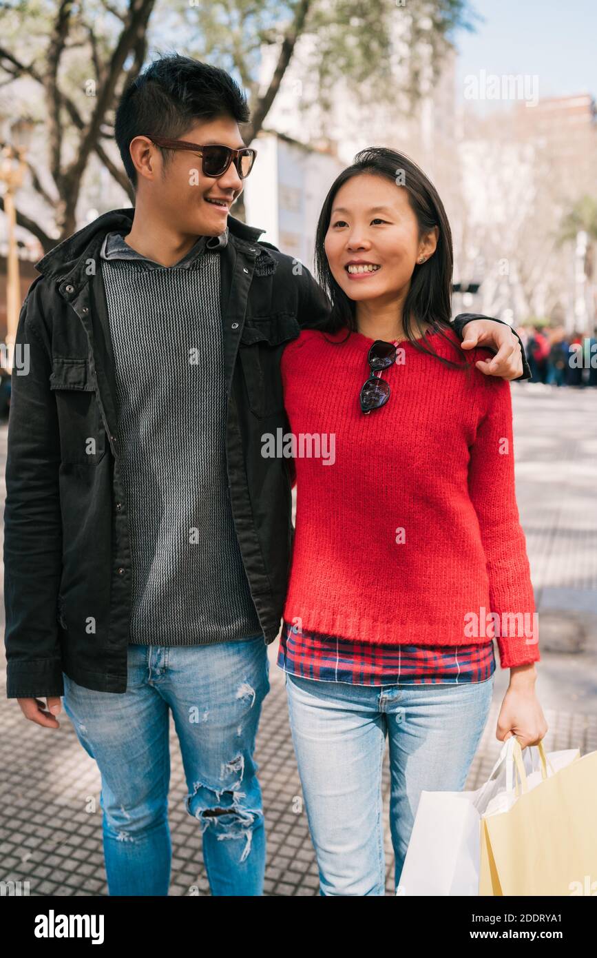 Asian man walking outdoor hi-res stock photography and images - Alamy