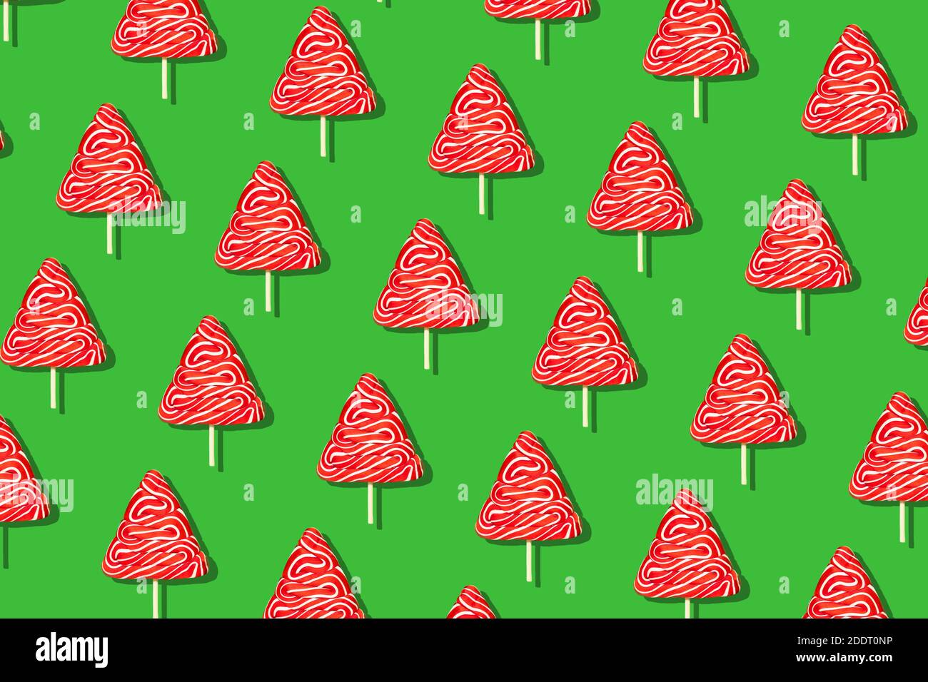 Seamless christmas pattern from sweet tree on green background. Stock Photo