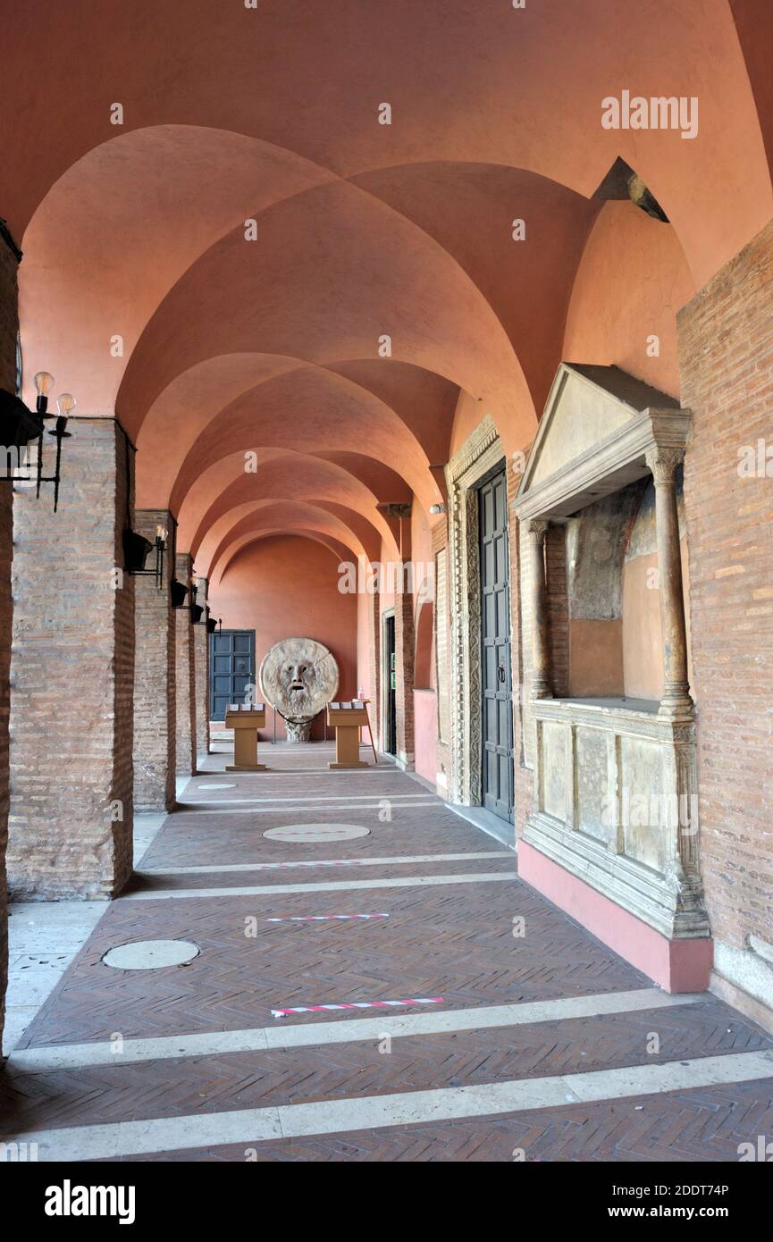 italy, rome, basilica di santa maria in cosmedin, portico with the bocca della verità (mouth of the truth) Stock Photo