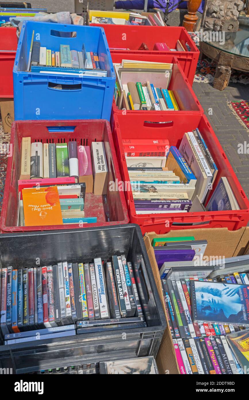 Amsterdam, Netherlands - May 16, 2018: Dvd Discs Games and Books in Boxes  at Flea Market in Amsterdam, Holland Stock Photo - Alamy