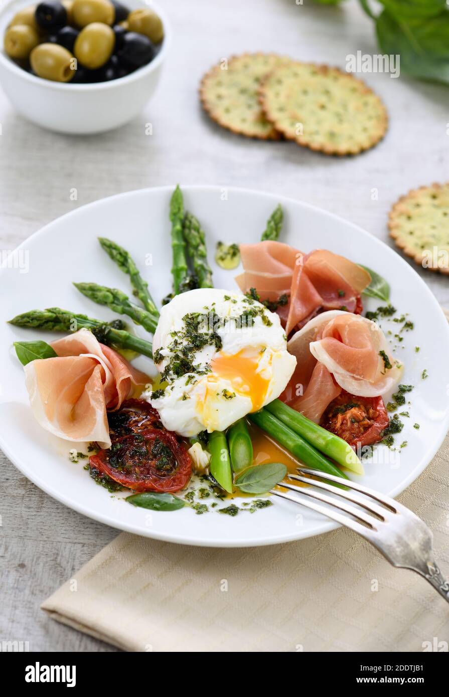 Best Eggs Benedict Poached eggs with prosciutto, asparagus, sundried