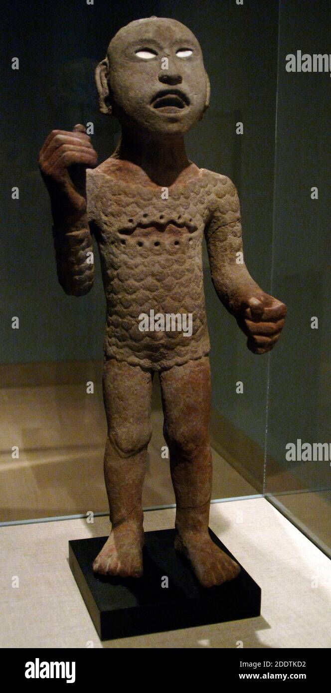 Statue depicting Xipe impersonator. Aztec. Last Postclassic Period (1350-1521). Volcanic stone, shell and paint. Area of Mexico City. Dallas Museum of Art. State of Texas. United States. Stock Photo