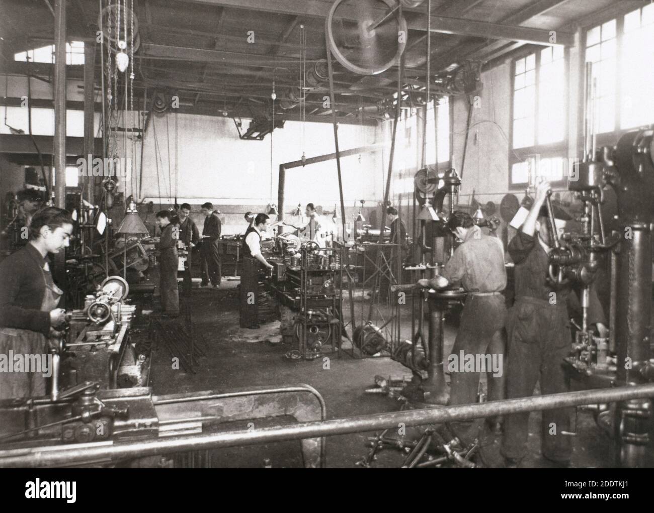 Spanish Industry, 1945. Production line of a company dedicated to the manufacture of motorcycle components. Mechanical workshop. Spain, Catalonia, Barcelona. Stock Photo