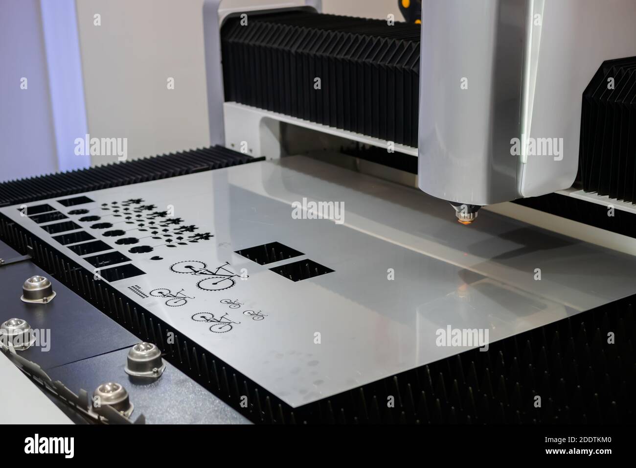 Automatic cnc laser cutting machine working with sheet metal Stock Photo