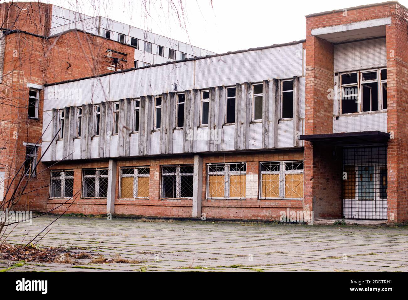 Old abandoned brick building with broken windows close up Stock Photo ...