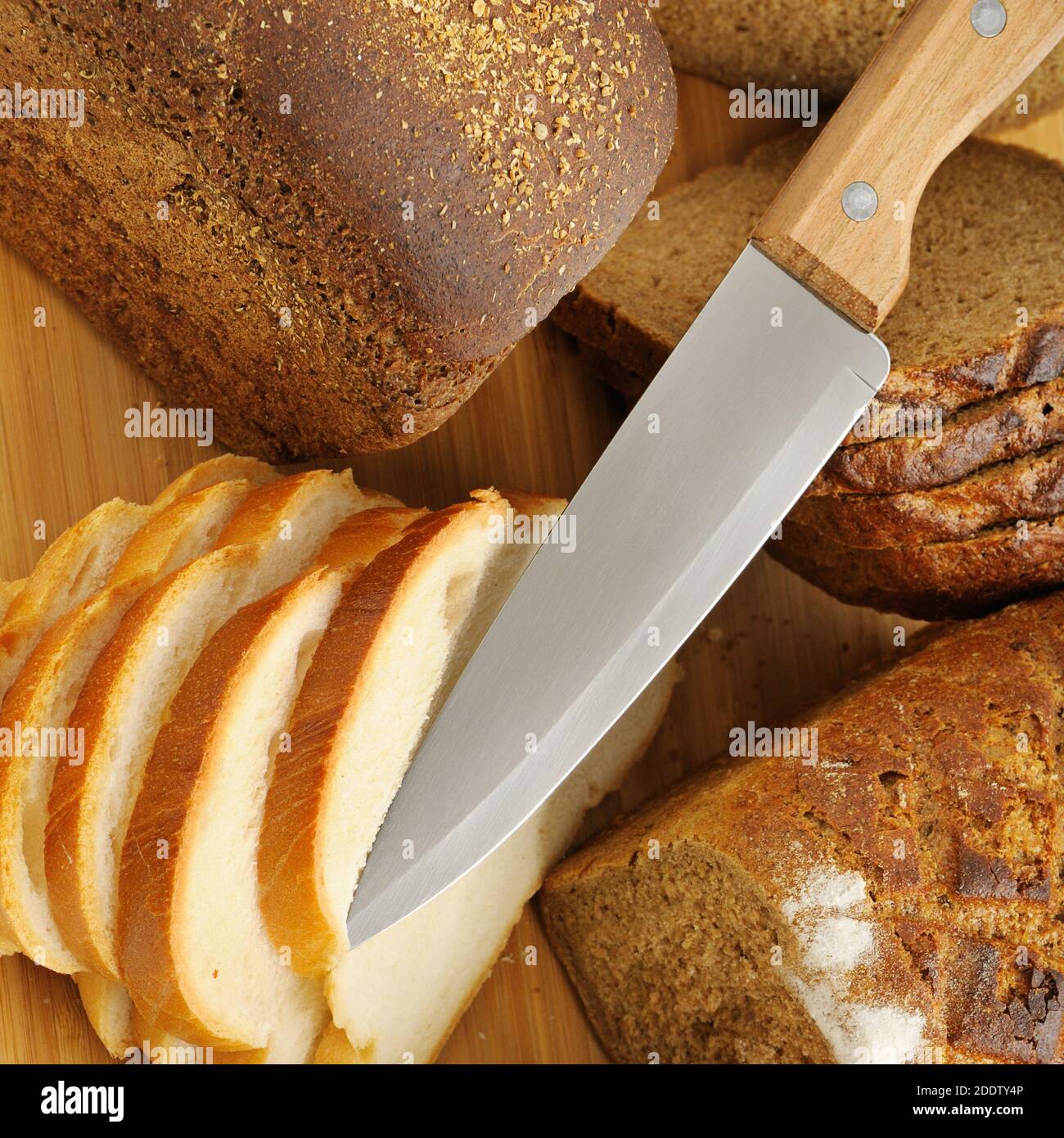 cut bread and knife Stock Photo