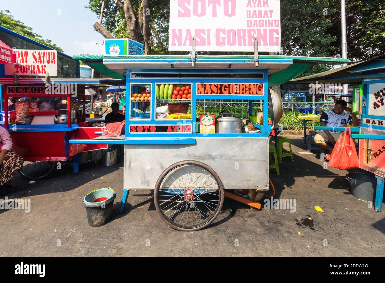 A food cart selling popular street food in the streets of Jakarta