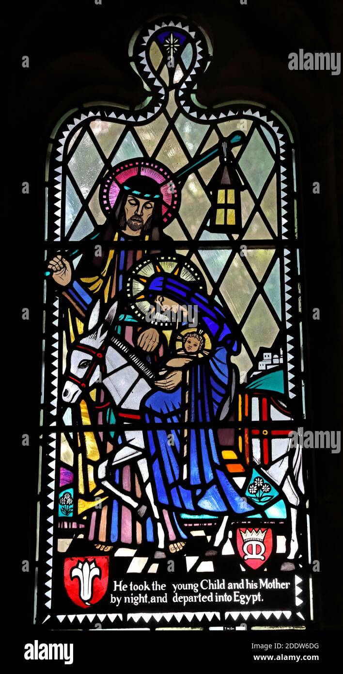 Lewis Carroll window,All saints,Daresbury Village,Warrington,Cheshire,Joseph,Mary,Jesus,child Stock Photo