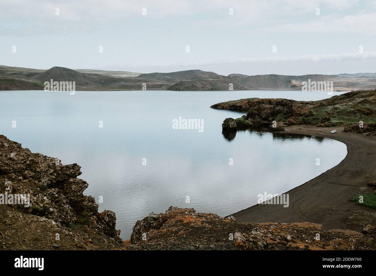 Kleifarvatn is a stunning lake in a black volcanic landscape in the Reykjanes Peninsula of South West Iceland. Stock Photo