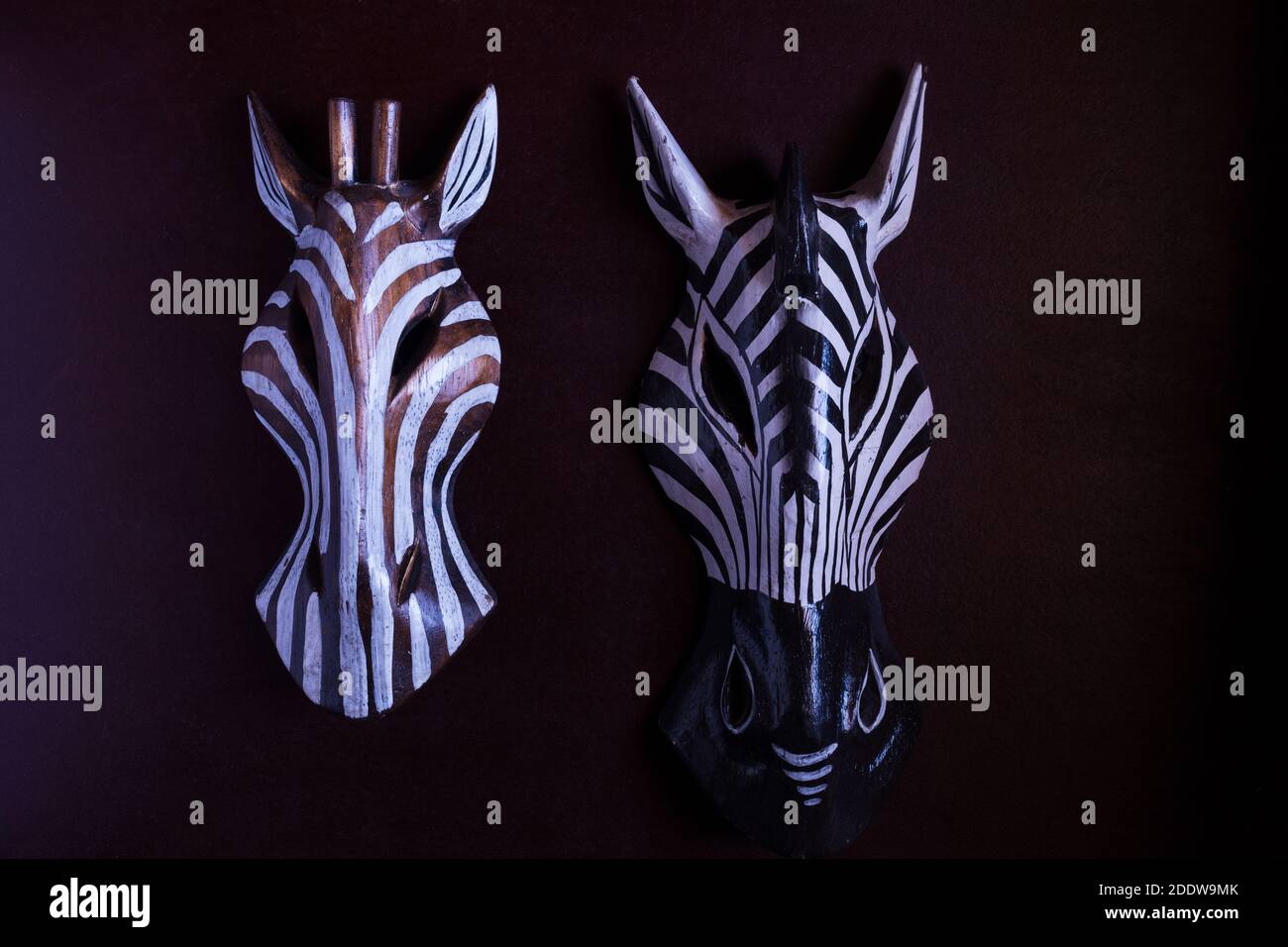 Traditional African wooden zebra Masks on dark background Stock Photo