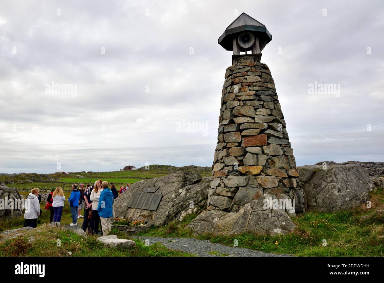 Sightseers at the Fishermen's Memorial at Ferkingstad, Karmoy, Norway, which commemorates the lives of fishermen lost in American waters. Stock Photo