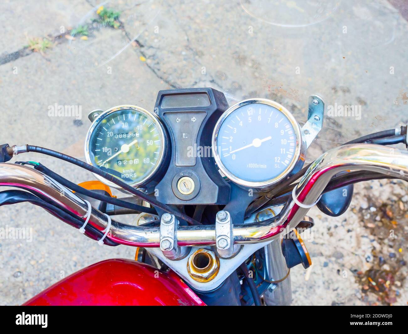 Chrome motorcycle handlebar with wires speedometer and tachometer