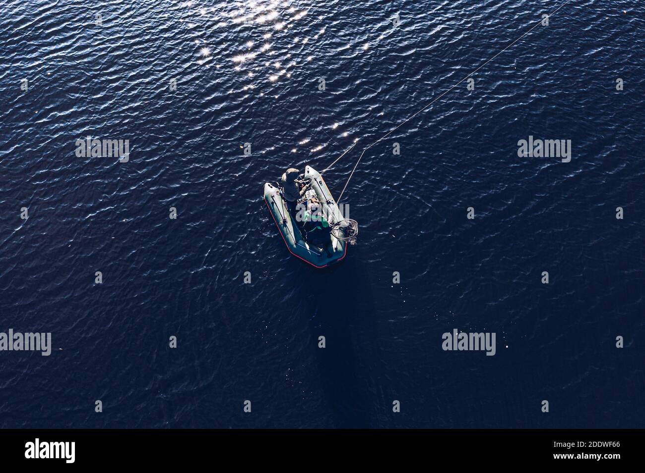 Aerial view of the fishing boat in the middle of the lake Stock Photo ...