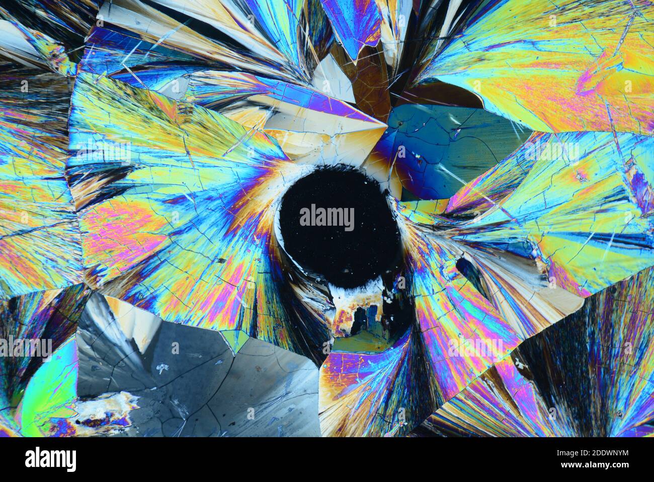 Crystals of tartaric acid under microscope with polarized light Stock