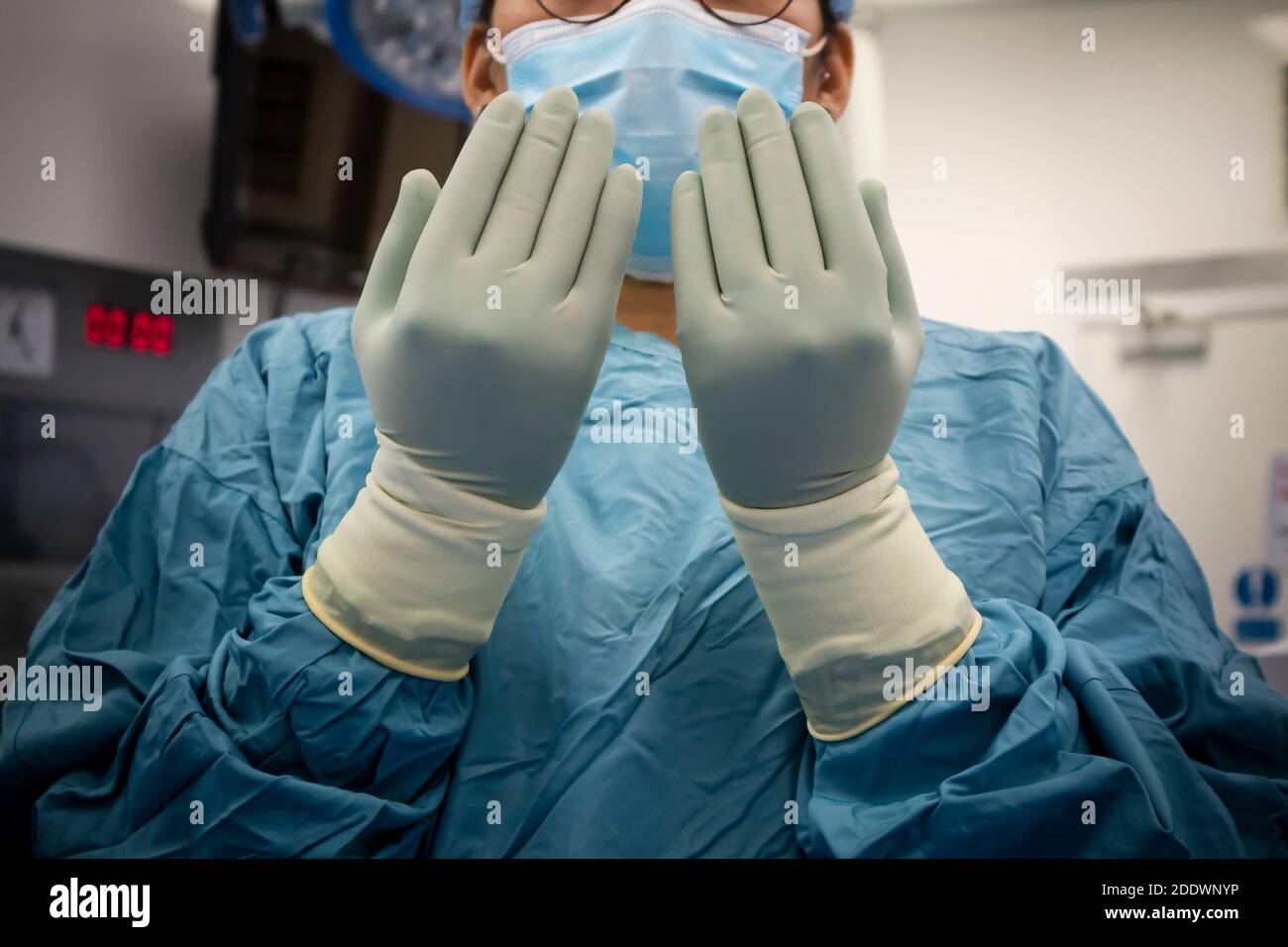 Scrub nurse in operating room getting ready for a neurosurgical