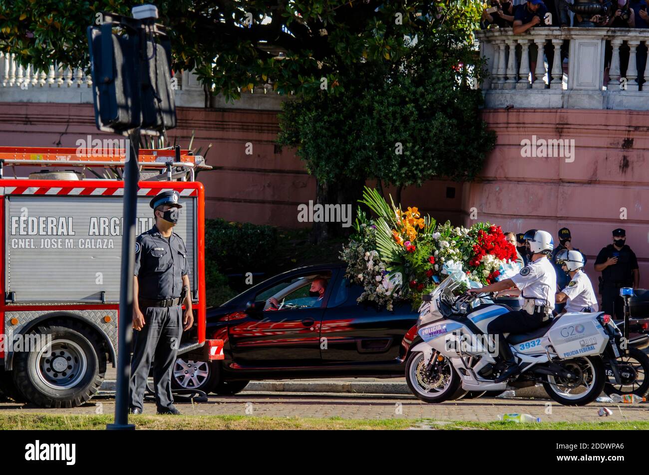 Hearse carrying Diego Maradona's coffin out of Casa Rosada (Argentina's Government House) to his funeral. Photo credit: Mateo Aberastain Stock Photo