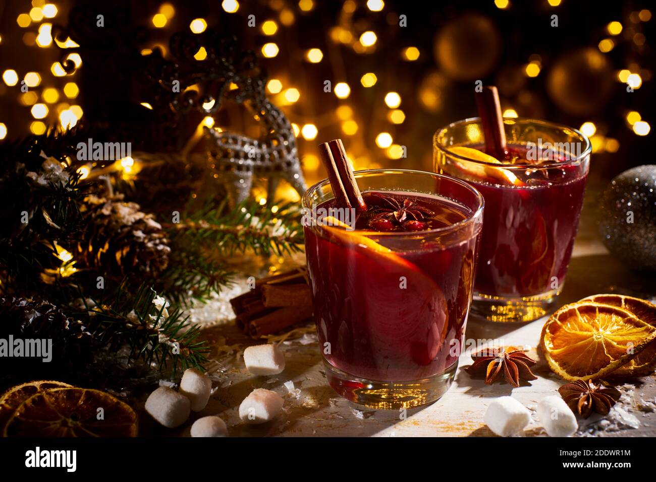 Two glasses of mulled wine on christmas decorations Stock Photo