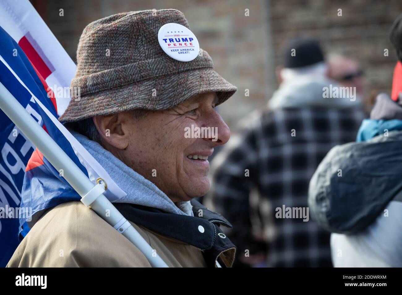 Pro Trump rally at a country music bar in Chicago's far south side Mount Greenwood neighborhood on the Sunday before Election Day. The outdoor rally was held in a parking lot next to the bar and along 111th street, a busy thouroghfare in the neighborhood. Stock Photo