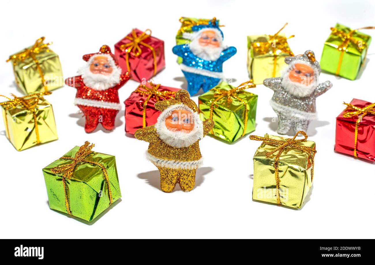 Santa Claus with Gift boxes on white backgrounds Stock Photo