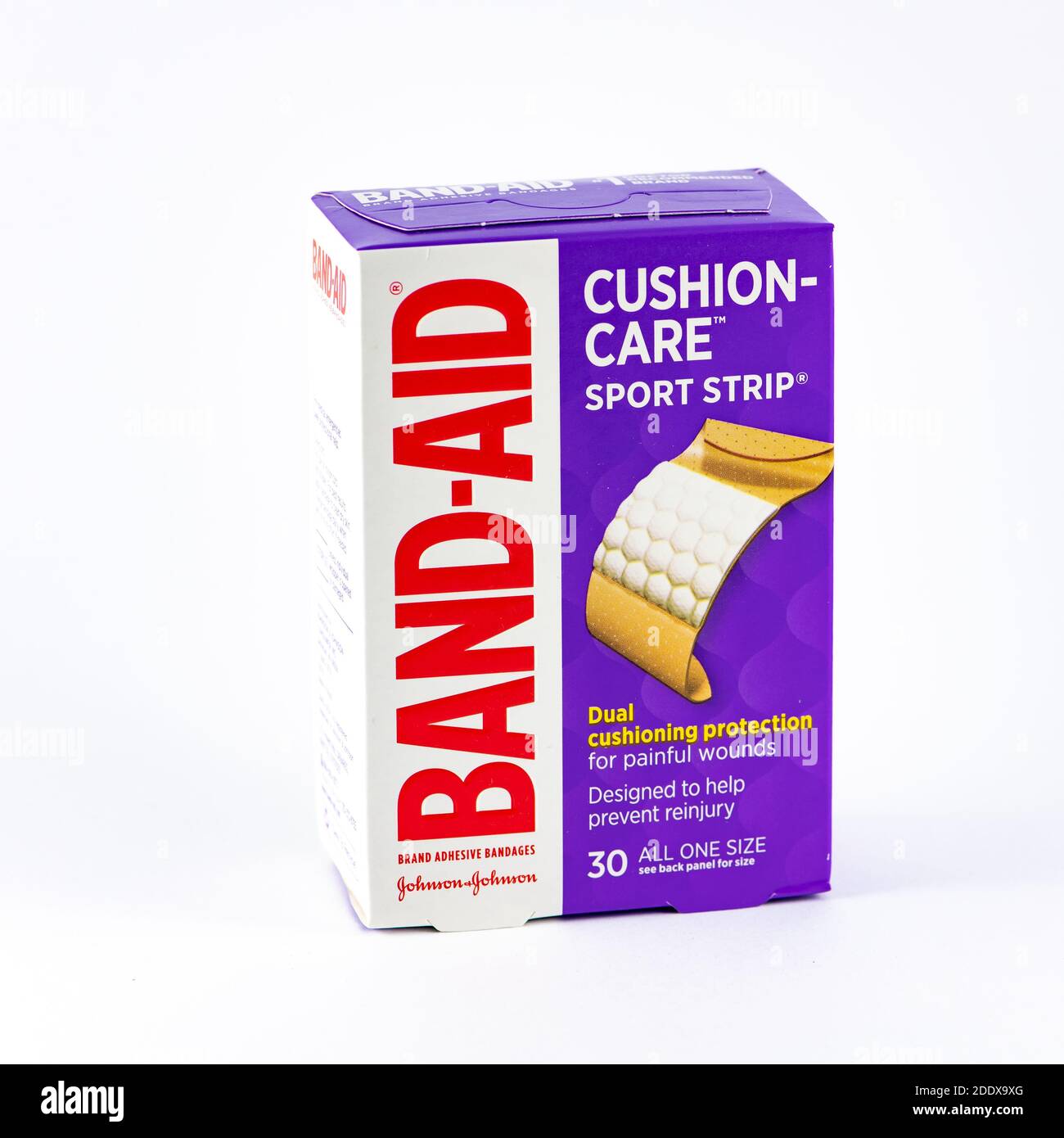 A box of Johnson & Johnson cushion care sport strip band-aids for painful wounds. Stock Photo