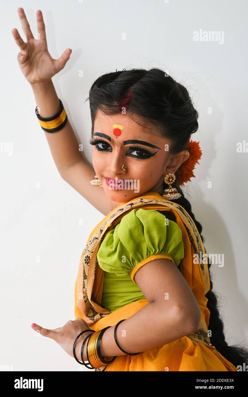 Portrait of a teenage girl posing in a traditional dress - Stock Photo -  Masterfile - Premium Royalty-Free, Code: 630-01078845