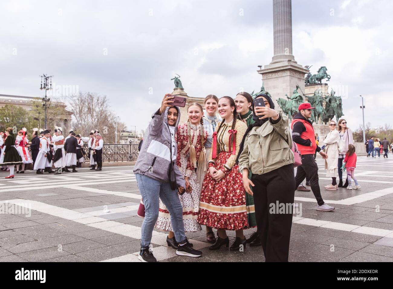 BUDAPEST, HUNGARY, 06 APRIL 2019: Spring celebration parade through the Budapest streets. Folk Dancers in national costumes in the Heroes Square. Phot Stock Photo