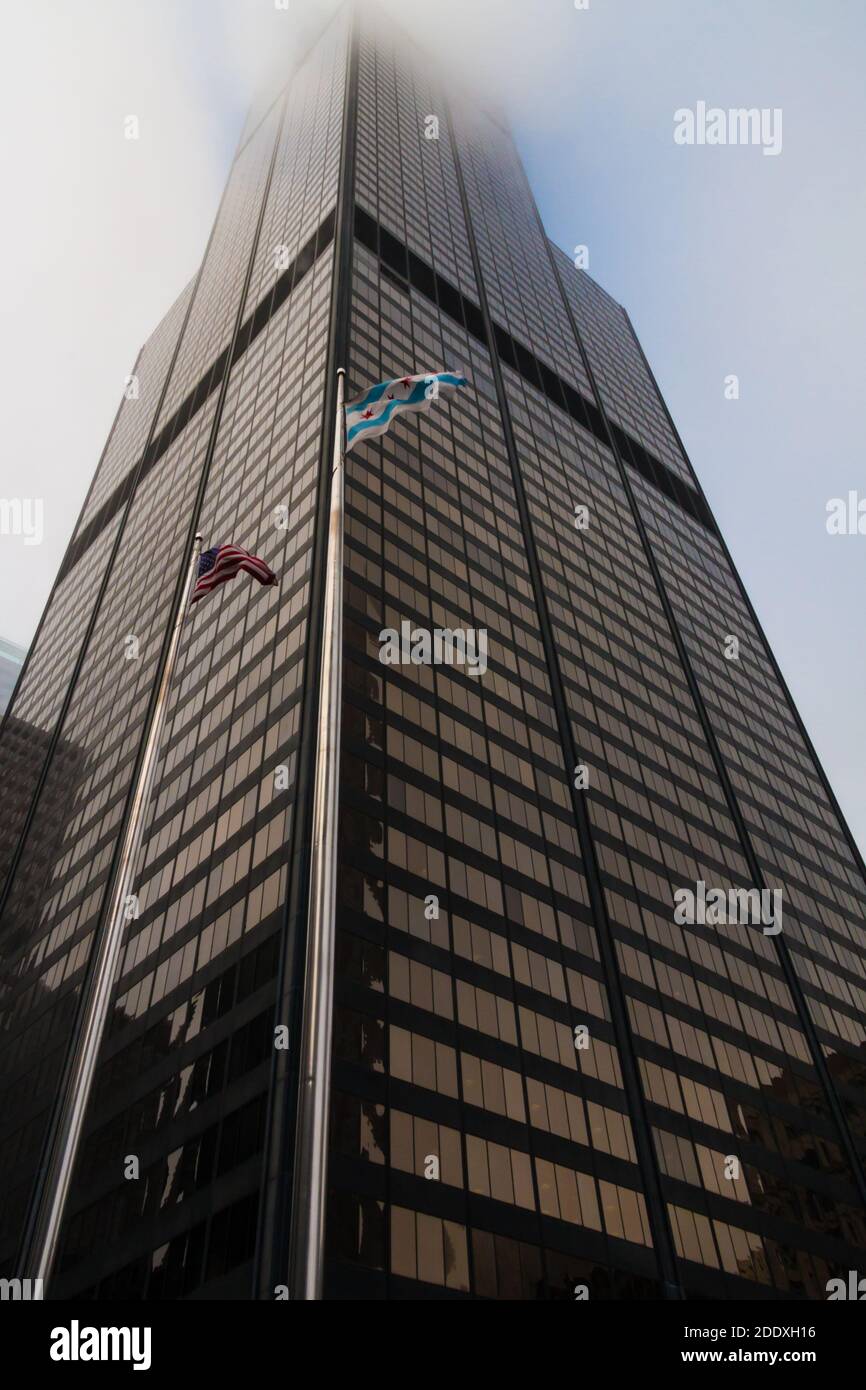 Chicago, IL, USA Jun 10 2011: Willis Tower skyscraper in downtown Chicago, Illinois reaching into the clouds. This skyscraper was formerly Sears Tower Stock Photo