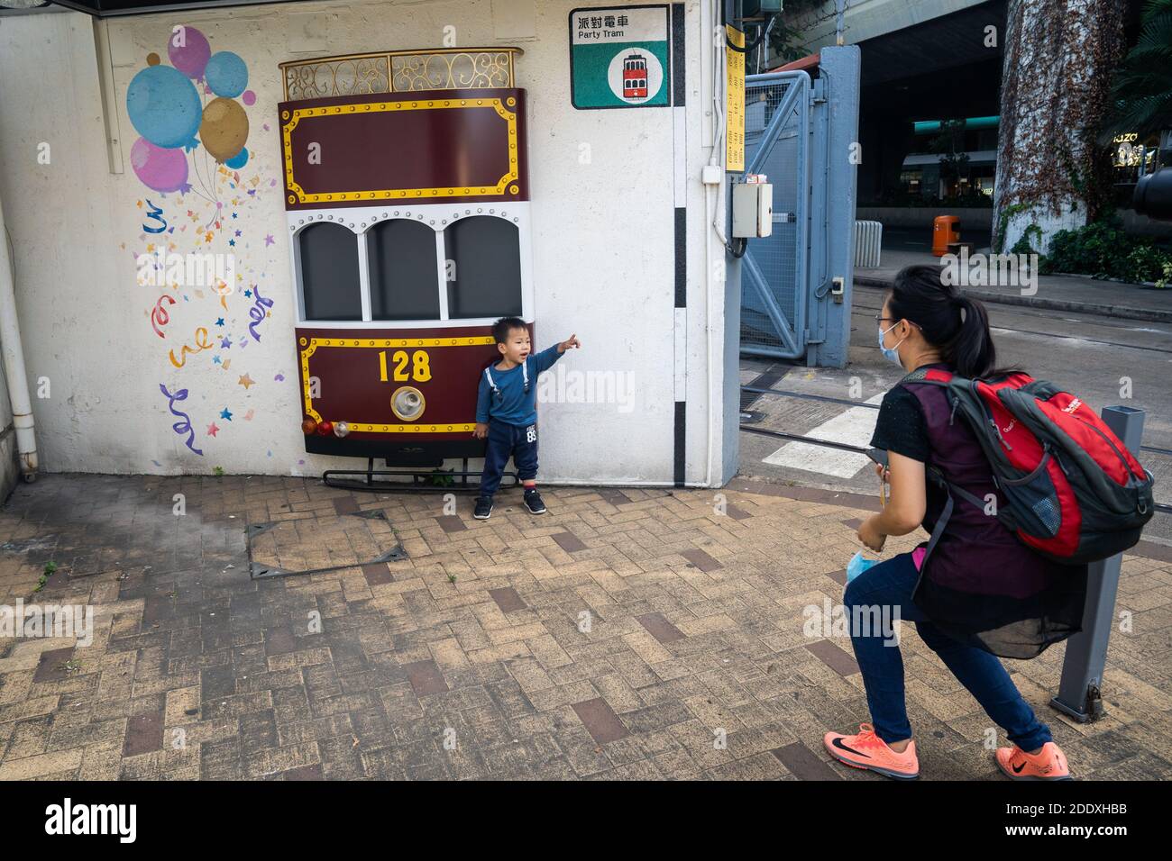 A child seen posing for a photo at the entrance of the Whitty Street tram Depot.Whitty Street