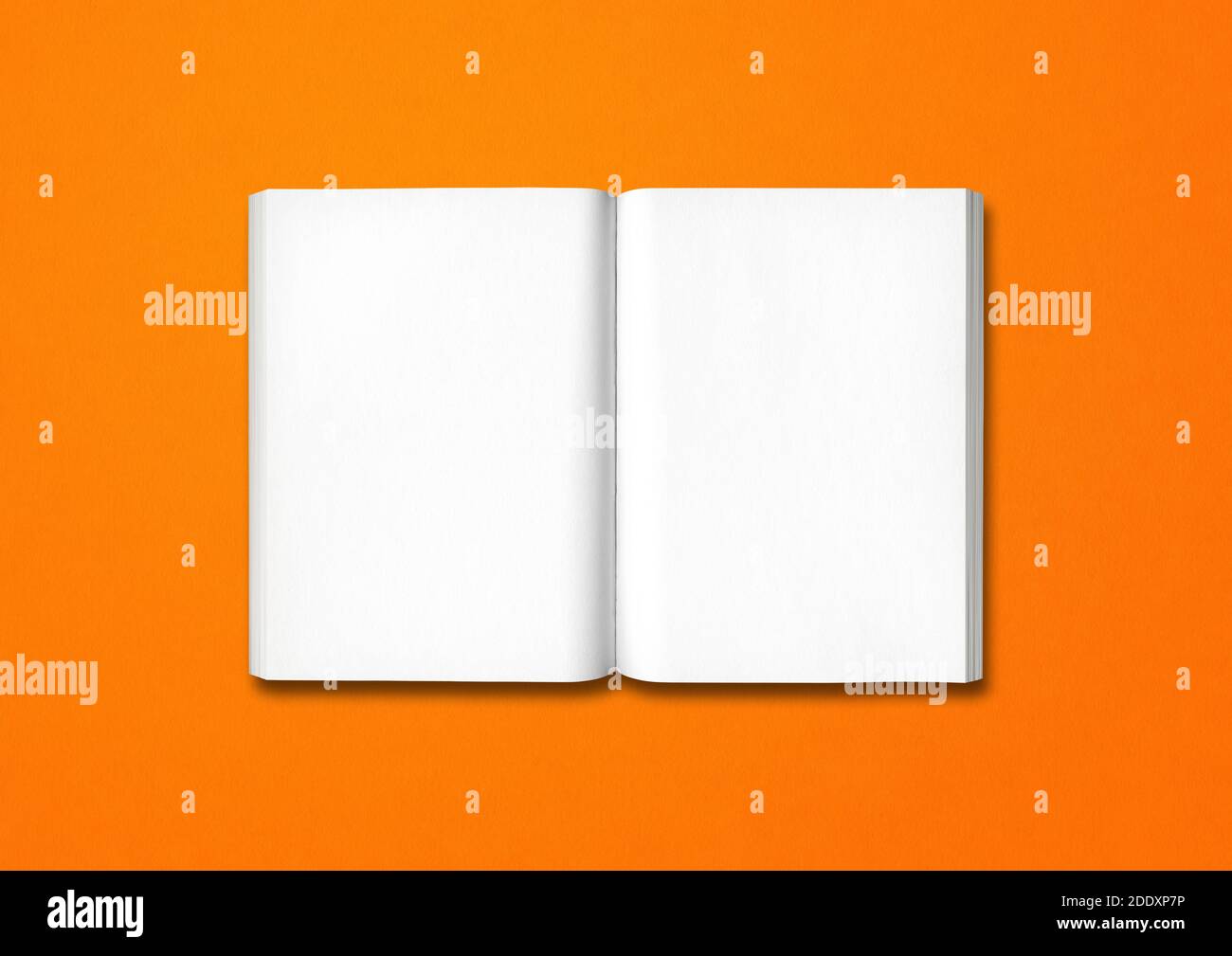 Open book isolated on a orange background Stock Photo