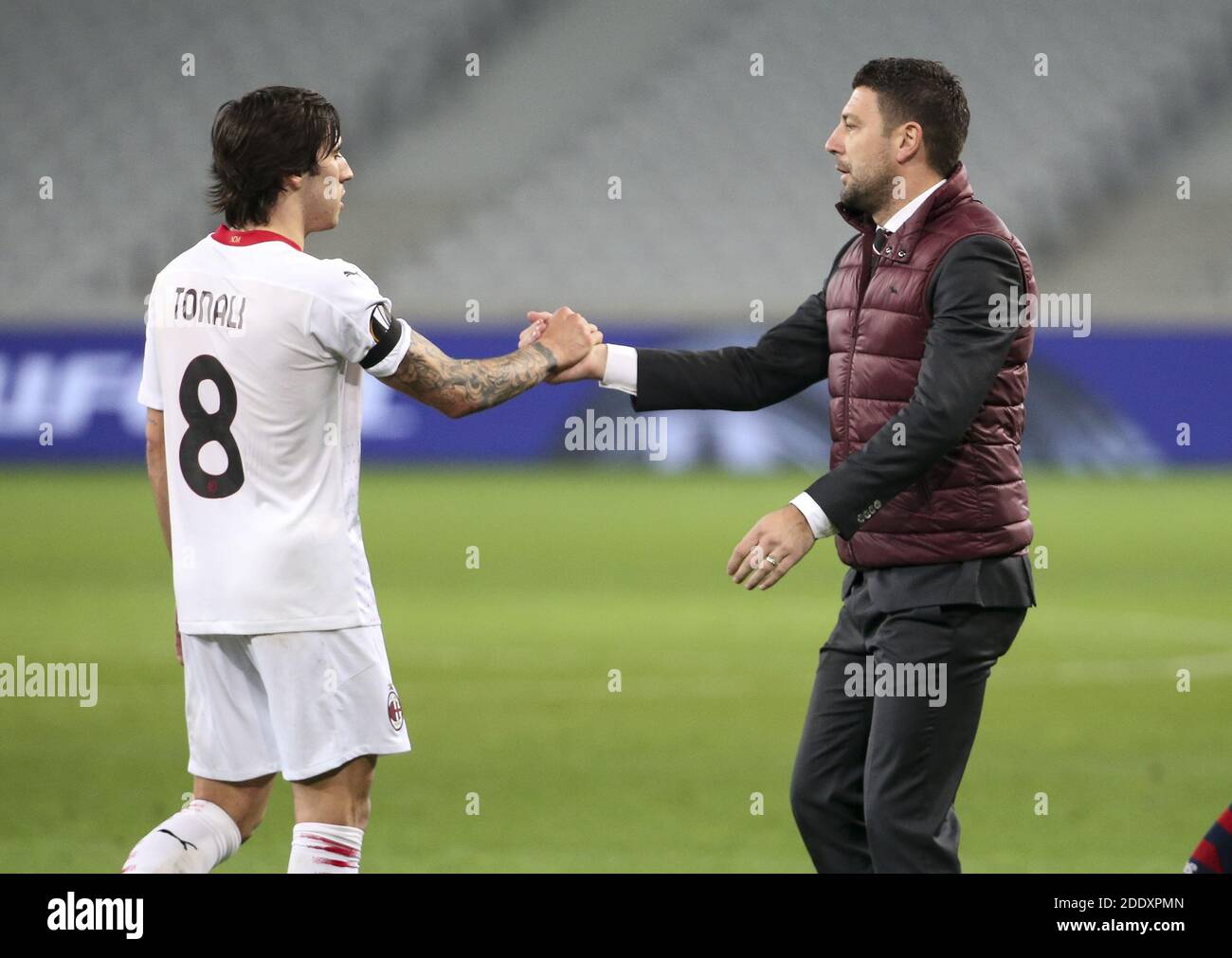 Lille, France. 26th Nov 2020. Sandro Tonali of AC Milan, coach of AC Milan  Stefano Pioli following the UEFA Europa League, Group H football match  between Lille OSC and AC Milan on