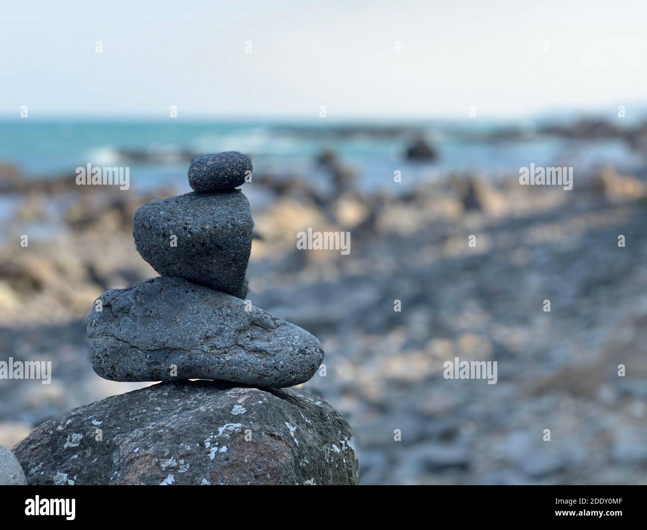 Zen stack of pebbles on the beach Stock Photo - Alamy