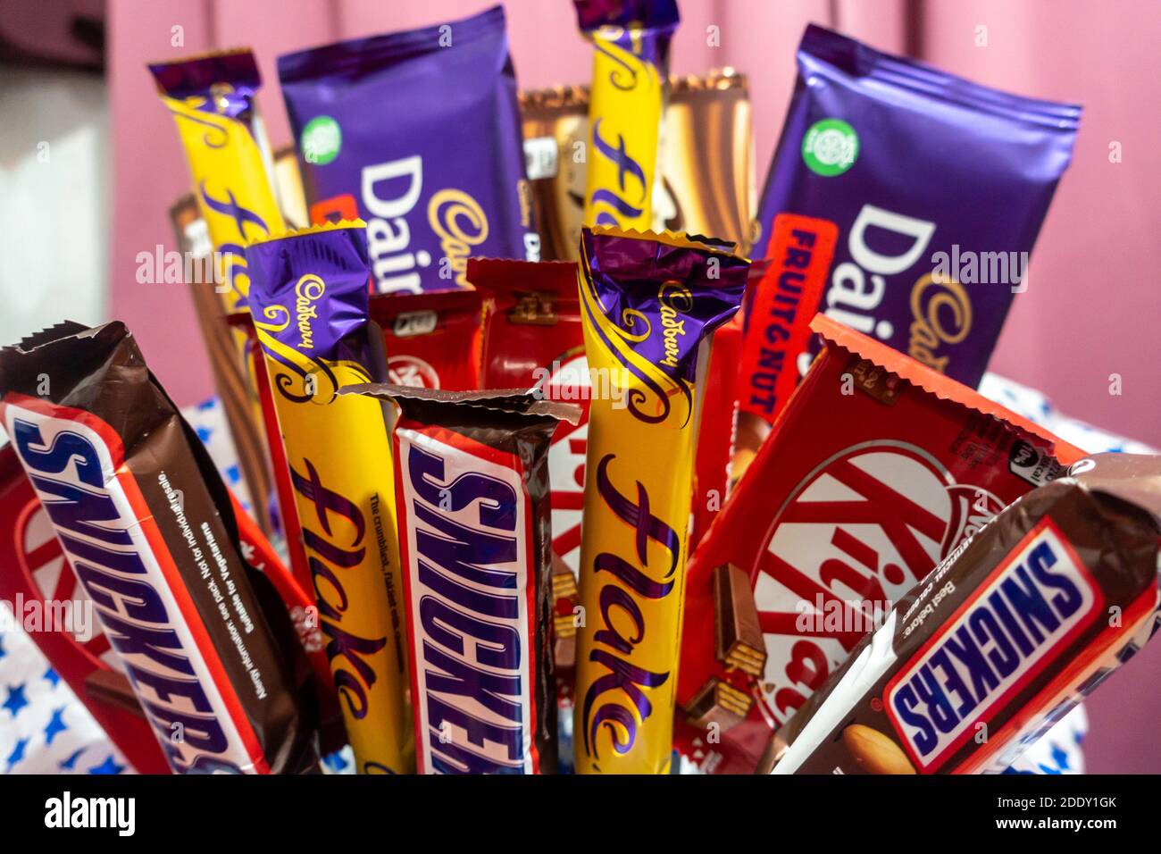 An arrangement of different chocolate bars given as a present. Stock Photo