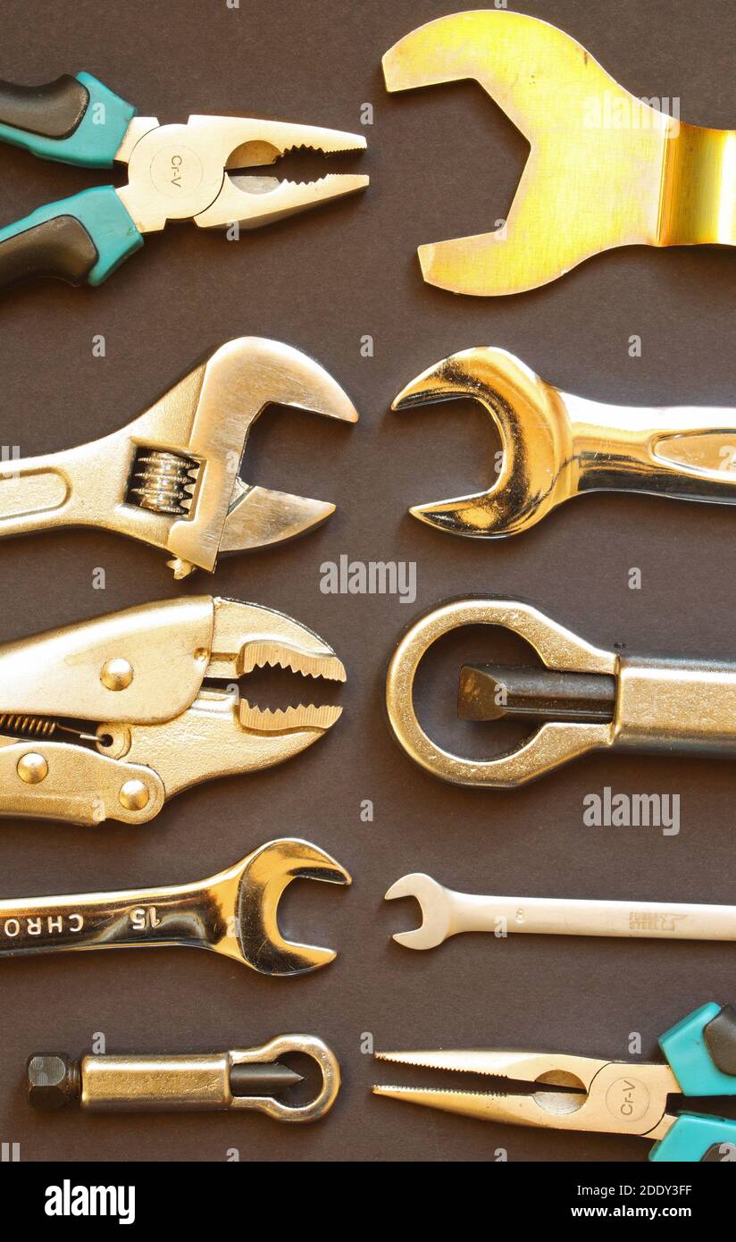 Variety of hand tools, including spanners, nut splitters, grips and pliers Stock Photo