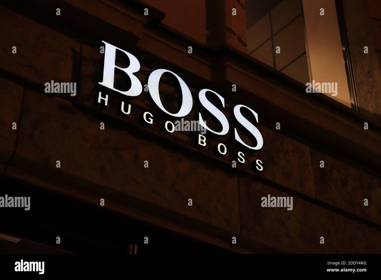 Berlin, Germany - November 14, 2020: Hugo Boss sign in front of their local  shop in Berlin Stock Photo - Alamy