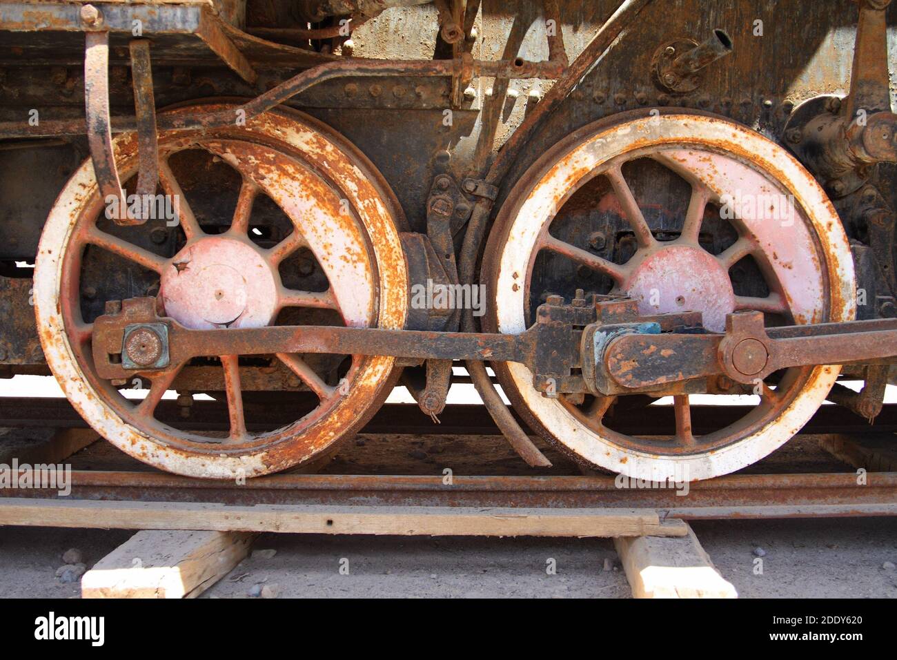 Wheels on an old train wagon at Humberstone mining ghost town, a UNESCO World Heritage Site in northern Chile Stock Photo
