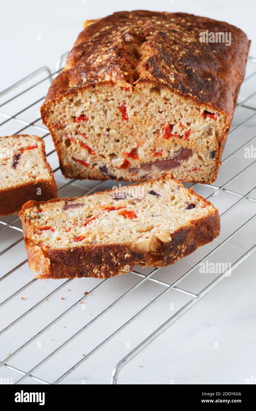 Homemade Red Pepper and Olive savoury cake. Stock Photo