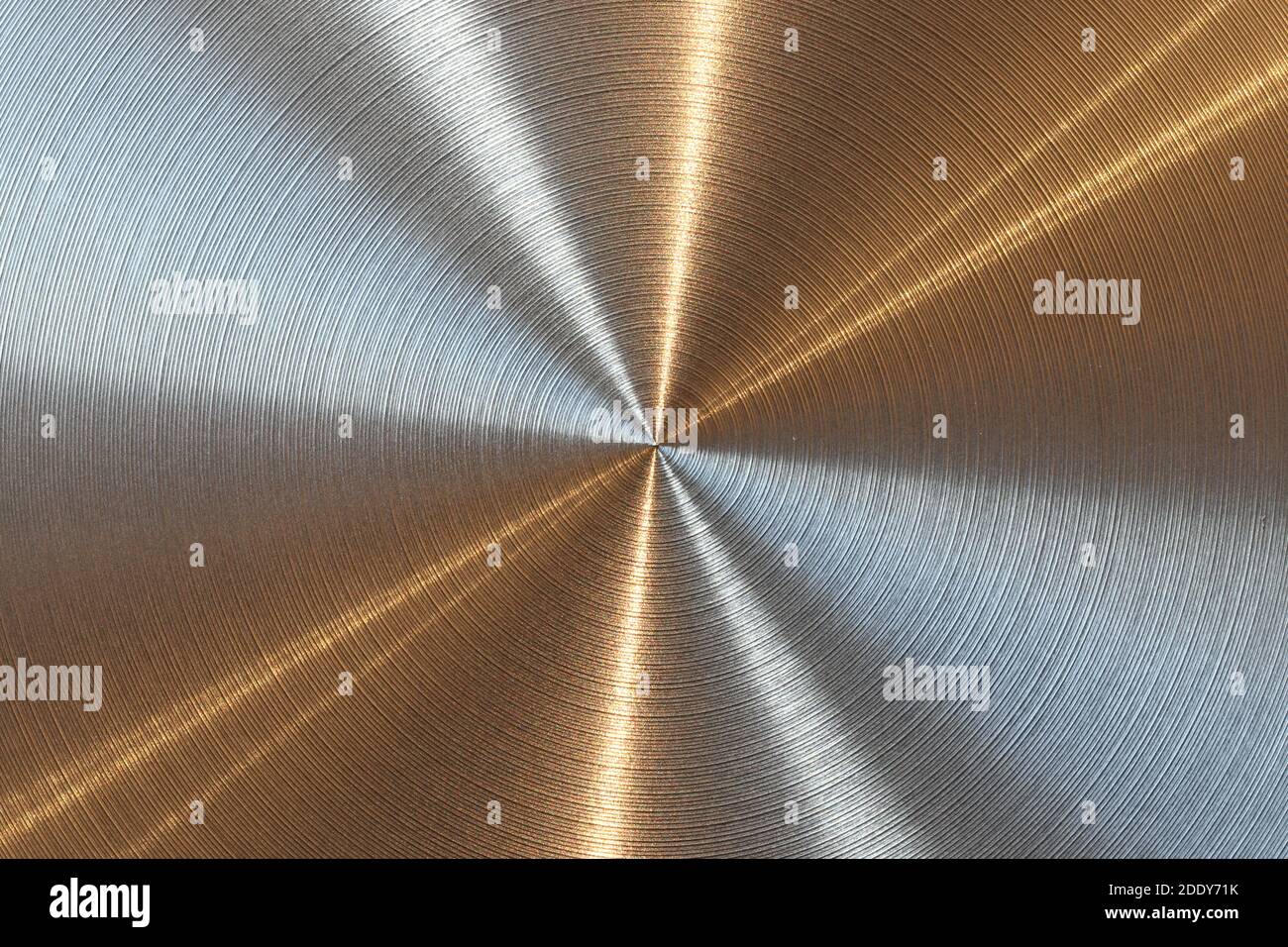 reflections on machined metal surface as background pattern Stock Photo