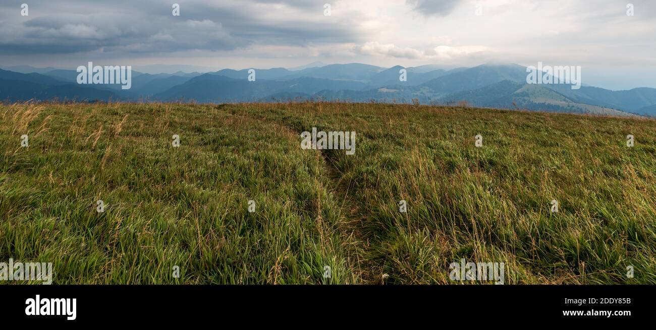 View from Ploska hill in Velka Fatra mountains in Slovakia with meadow and hills on the background Stock Photo