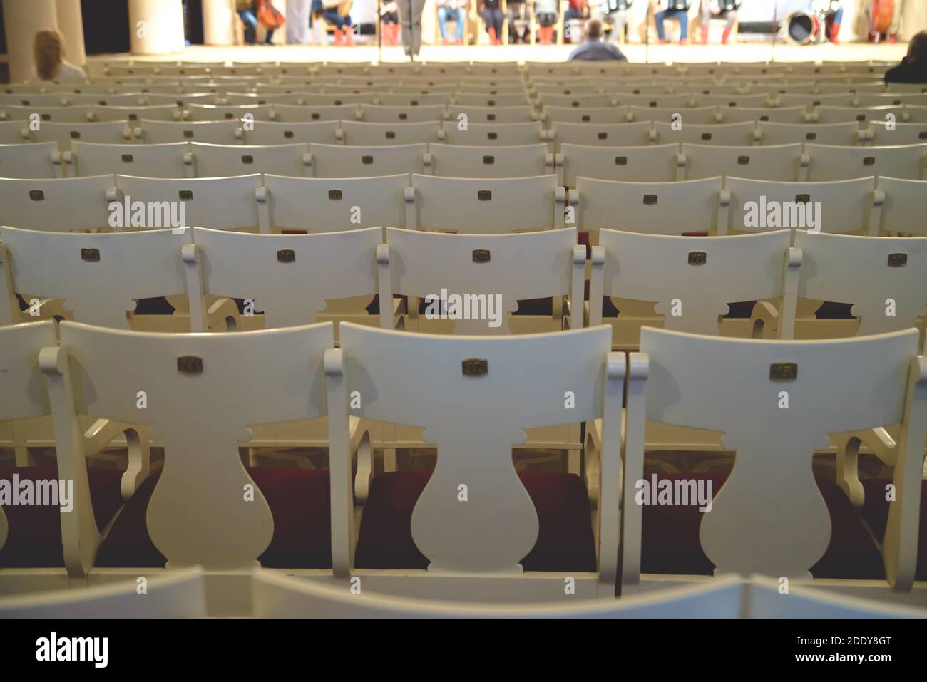 Empty rows of chairs in the theater. Shallow depth of field Stock Photo