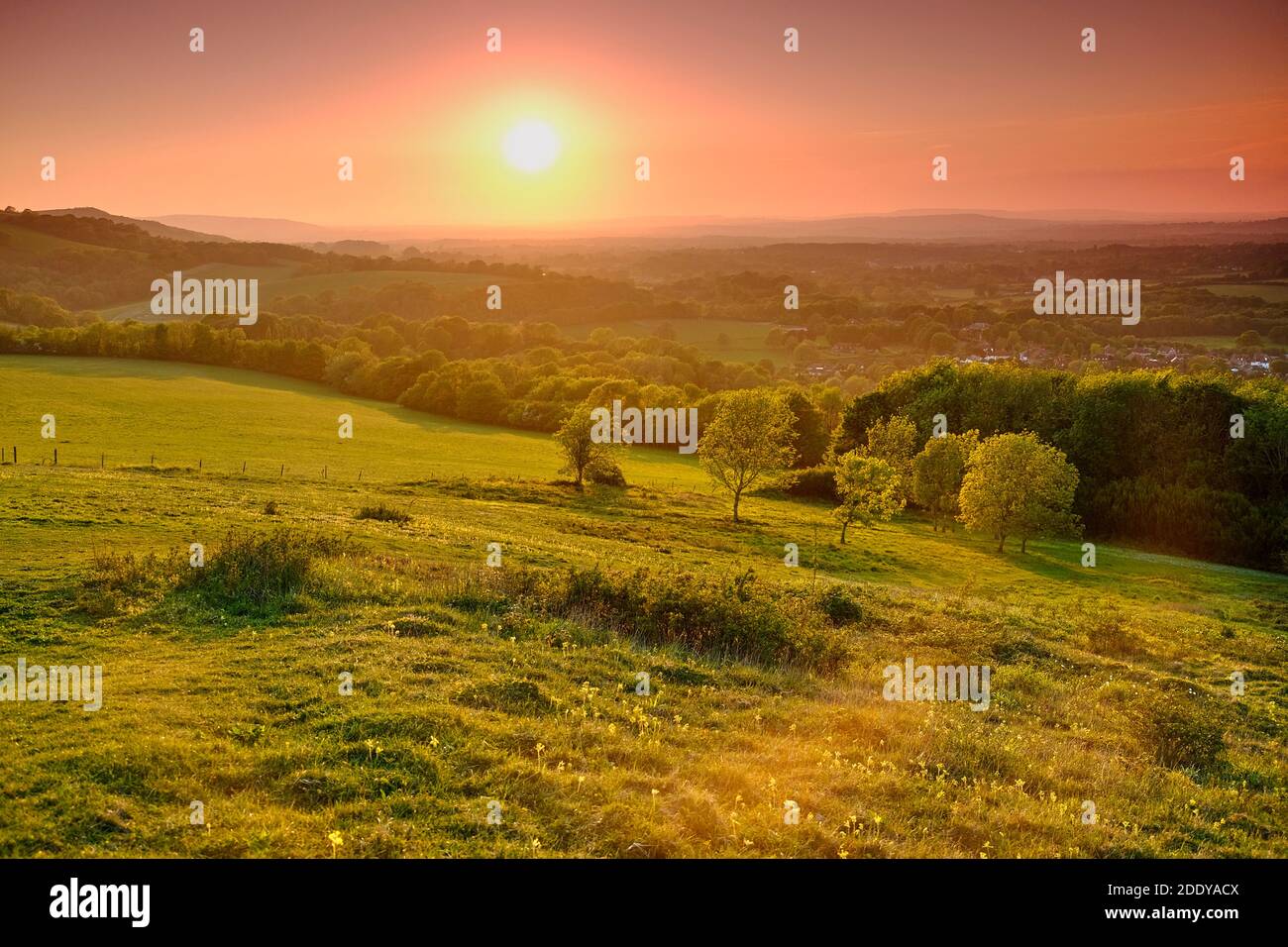 Sunset over Washington Village, South Downs National Park, West Sussex, England Stock Photo