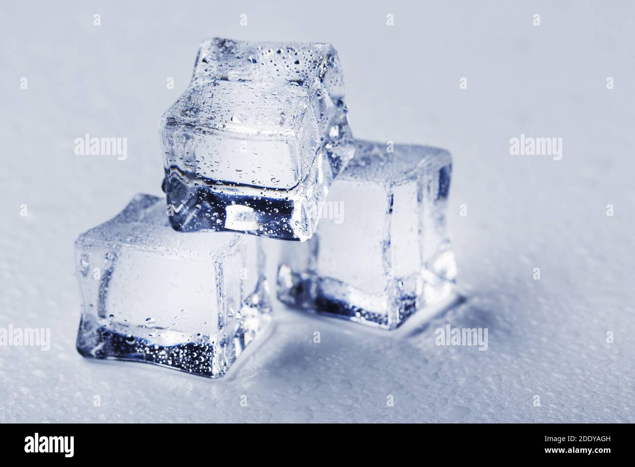 Blocks of Ice With water Drops close-up. Macro ice refreshing cube for a drink on a hot day Stock Photo