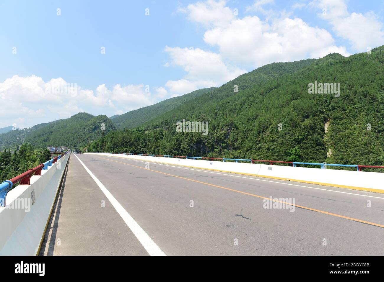 Villages cement road Stock Photo Alamy