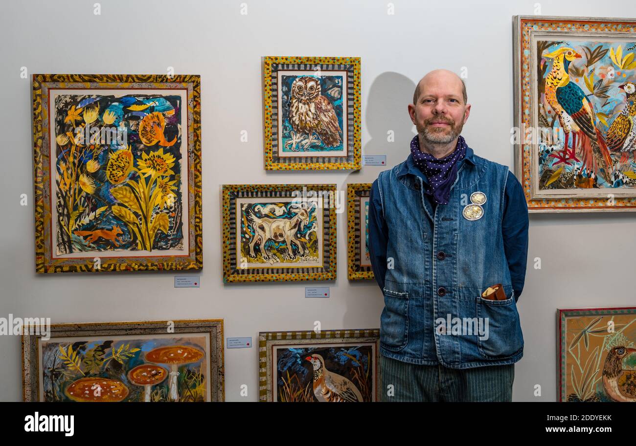 Scottish Gallery, Edinburgh, Scotland, UK, 27th November 2020. New exhibition preview: Mark Hearld’s Menagerie. The exhibition features a series of prints, woodcut and linocuts by Mark Hearld. Pictured: Mark Hearld with his colourful prints of British fauna Stock Photo