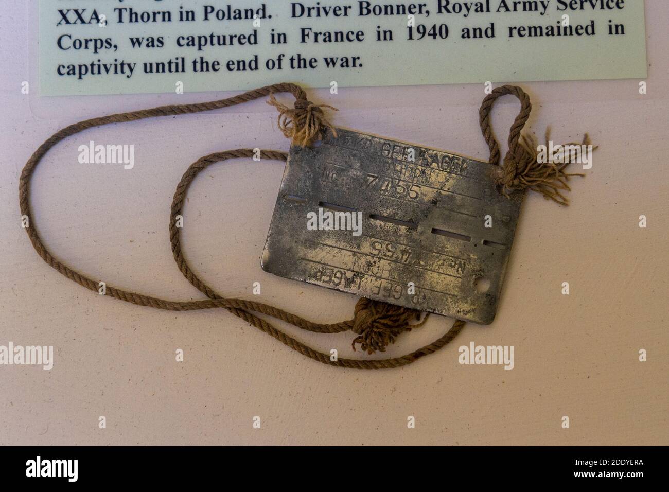 Identity tag worn by POW at Stalag XXA, Thorn, Poland, Thorpe Camp Visitor Centre, a WWII Royal Air Force barracks, Lincolnshire, UK. Stock Photo