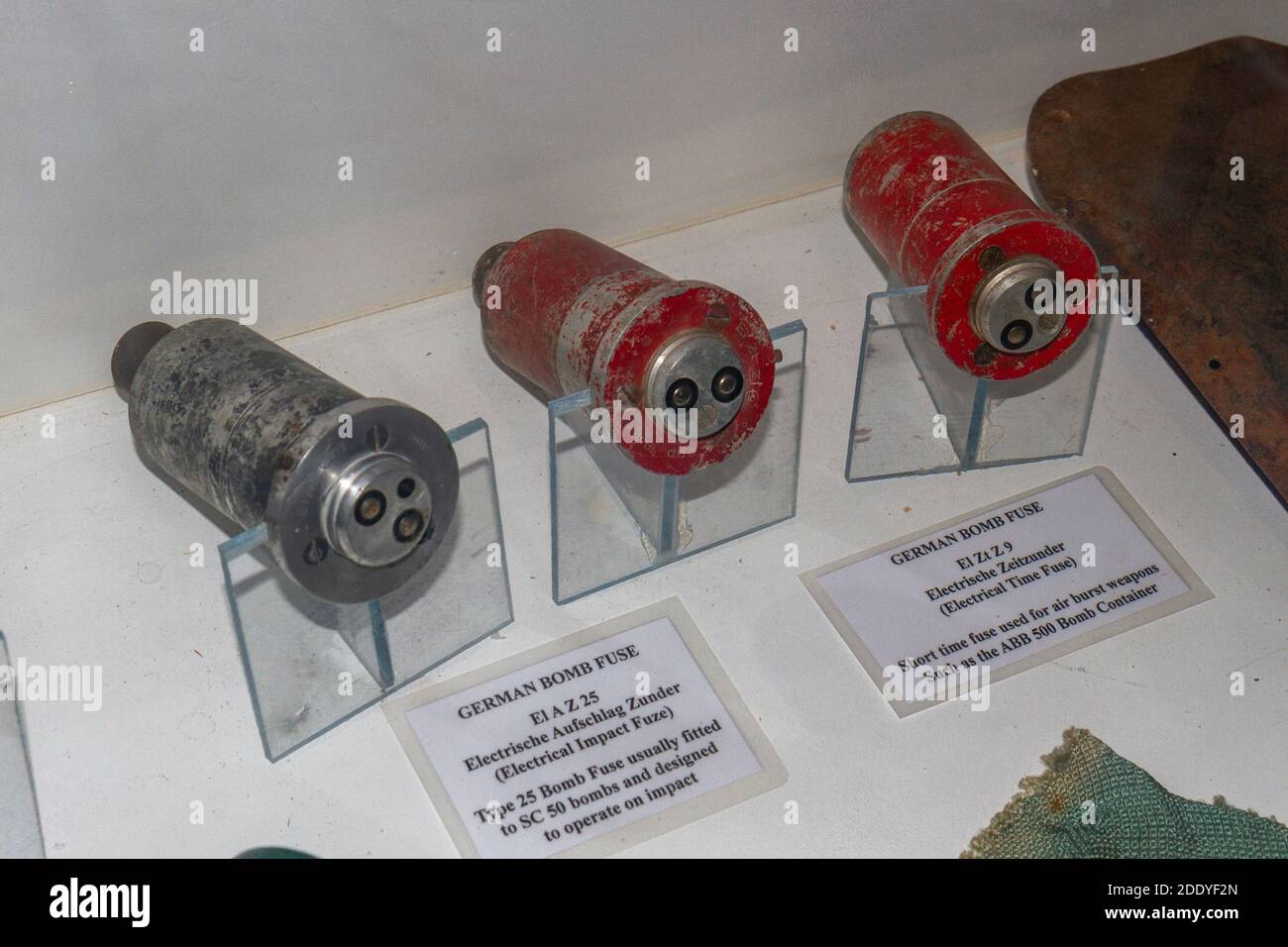 Three German WWII bomb fuses, Thorpe Camp Visitor Centre, a WWII Royal Air Force barracks, Lincolnshire, UK. Stock Photo