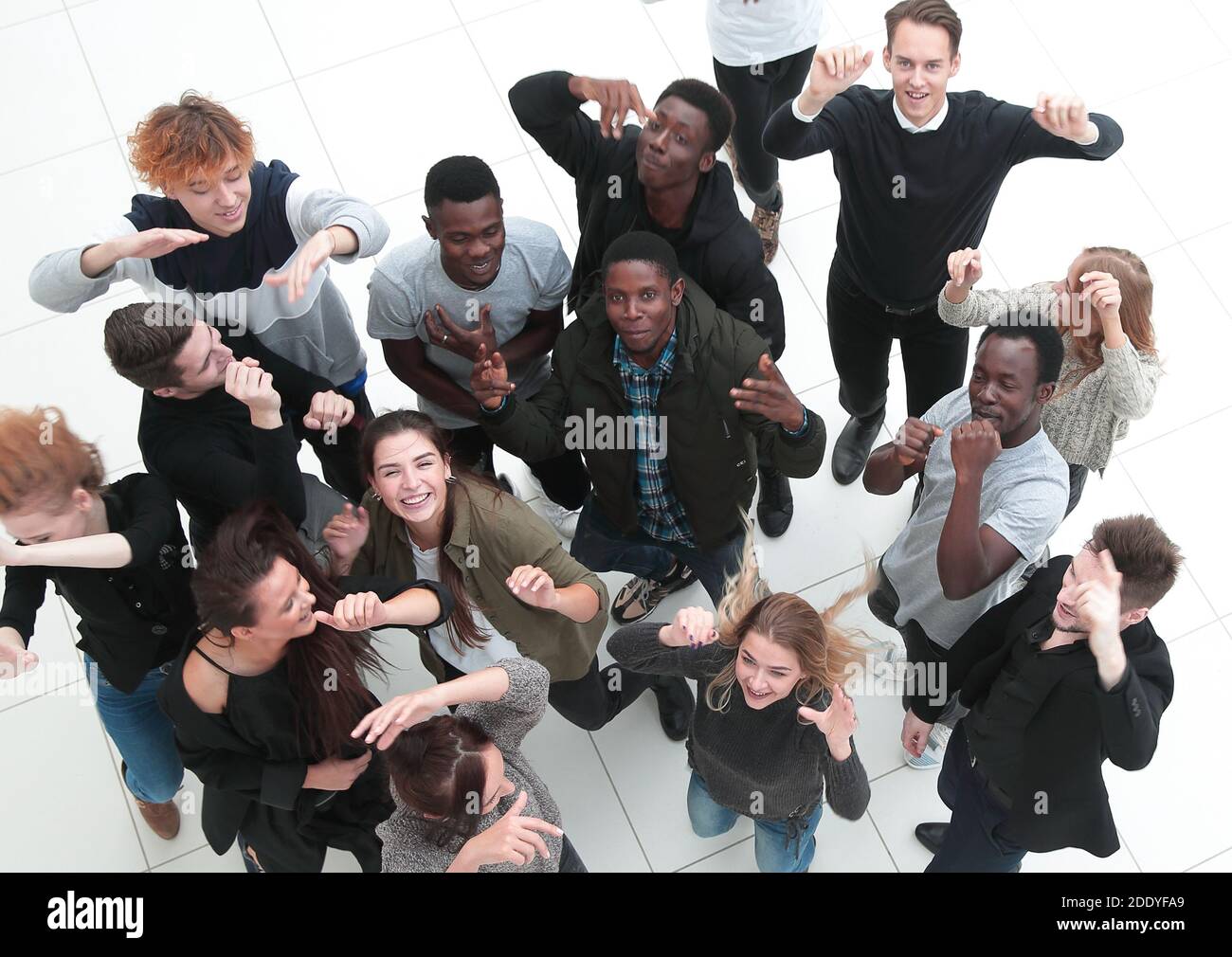 Portrait of thumb up smiling business people Stock Photo - Alamy