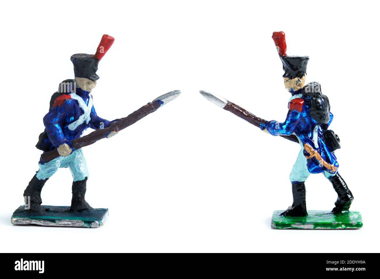 Shot of handmade vintage tin soldiers on the white background Stock Photo
