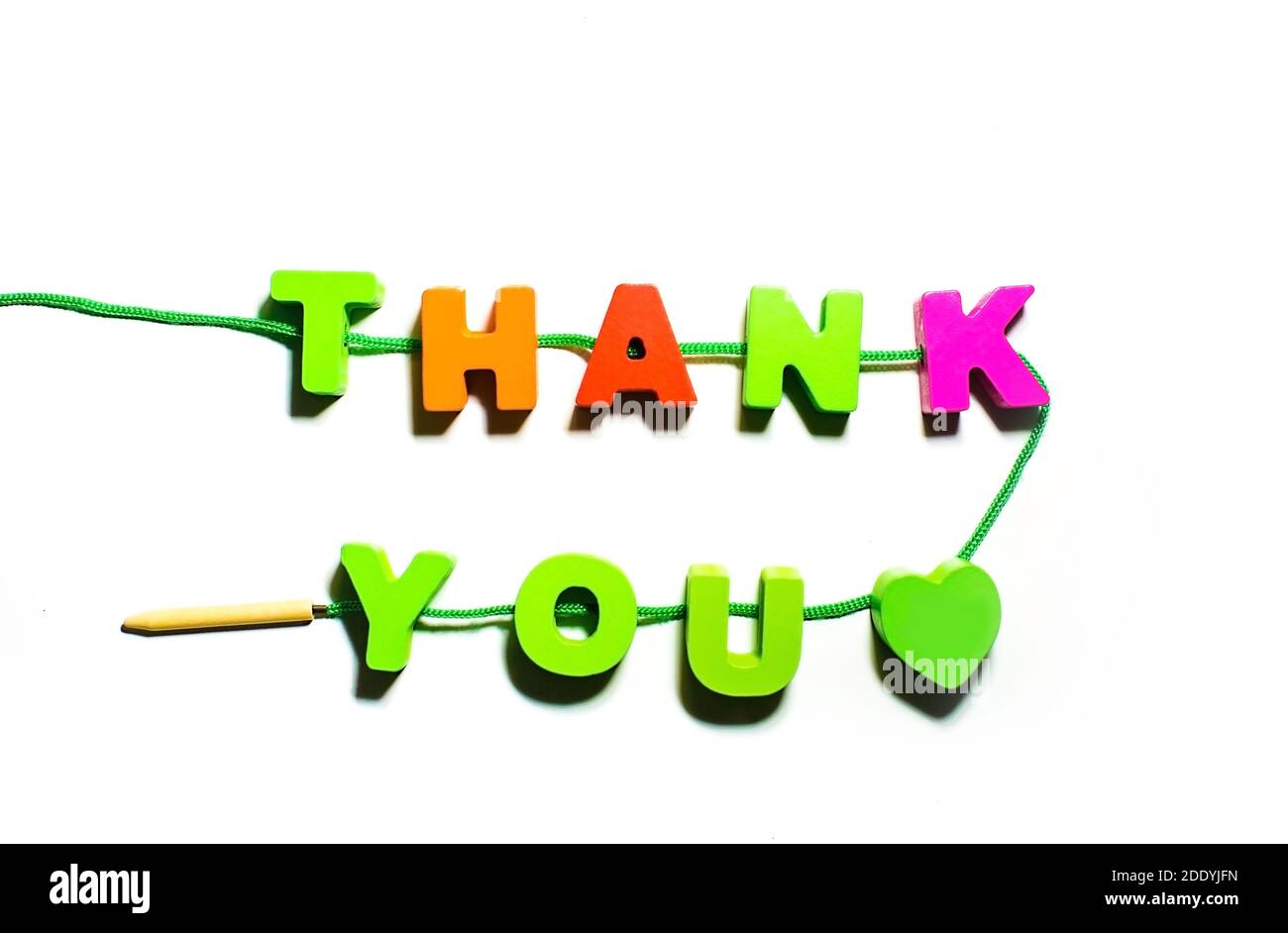 Wooden Colorful Leters Thank You With Green Heart Strung On A Lace Communication By Kids Toys Abc At White Background With Shadows Stock Photo Alamy
